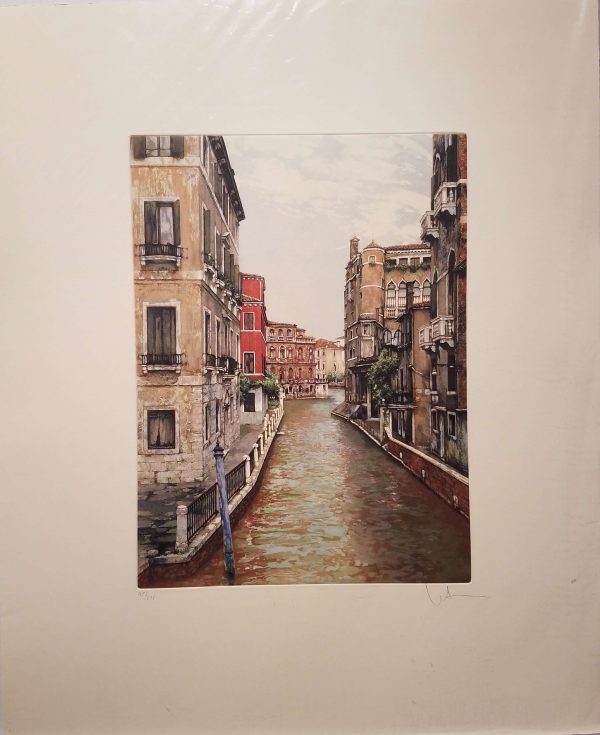 Beautiful aquatint of a view up a canal in Venice.